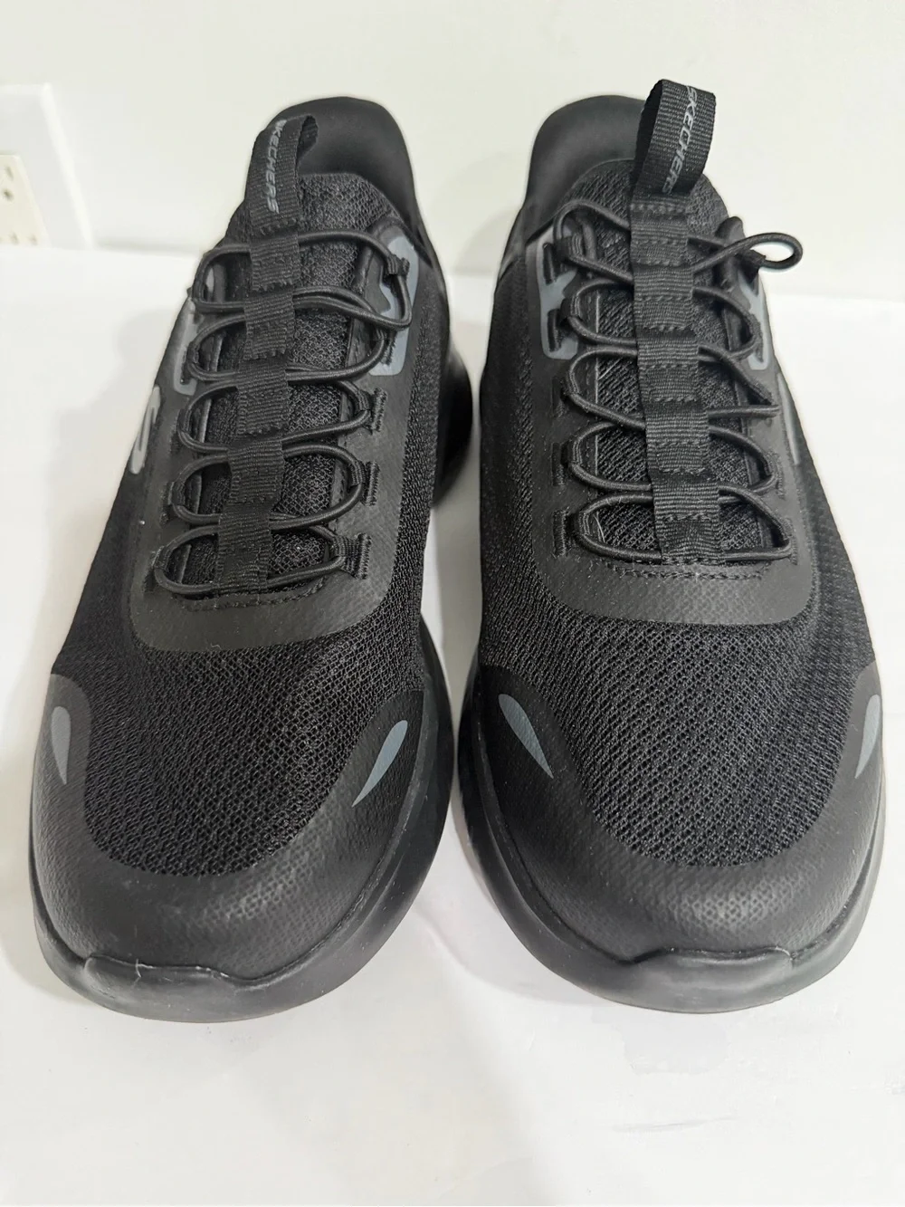 Skechers Men's Black Mesh Athletic Slip-On Sneaker with Gray Logo